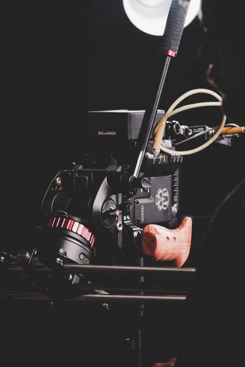 Professional camera in a dark film studio